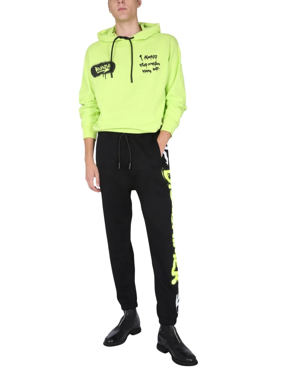 Disclaimer Printed Drawstring Track Pants